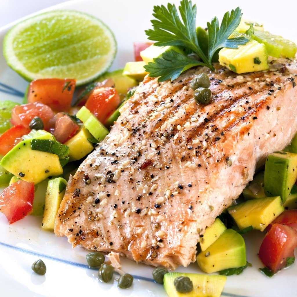 Grilled Atlantic salmon with an avocado and tomato salsa. Delicious healthy eating.