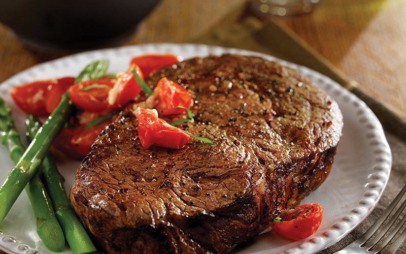 Ribeye Steaks with Sautéed Grape Tomatoes & Brie