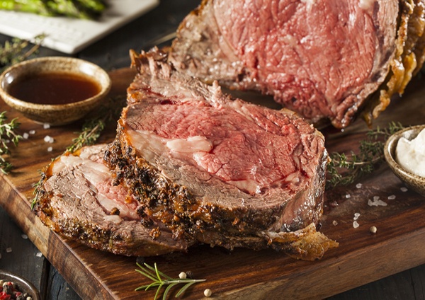Peppered Ribeye Roast with Roasted Garlic Sauce