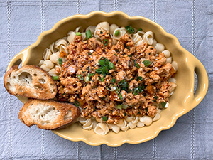 Turkey Bolognese pasta in a dish on the table