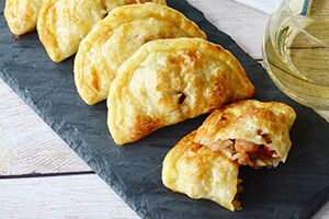 mushroom and shrimp Empanadas on cutting board