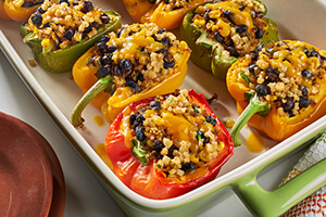 stuffed Mexican peppers in a baking dish on the table
