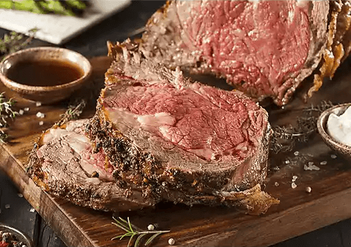 Peppered Rib Eye Roast With Roasted Garlic Sauce Crop