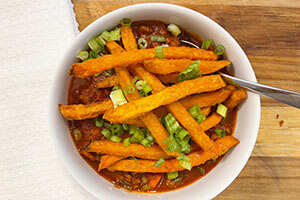 a bowl of beef and sweet potato chili