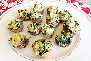 Artichoke and ricotta stuffed mushrooms on a plate