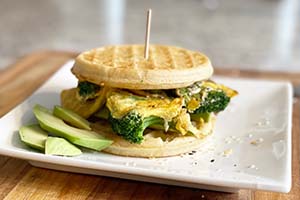 avocado, broccoli and egg waffle sandwich